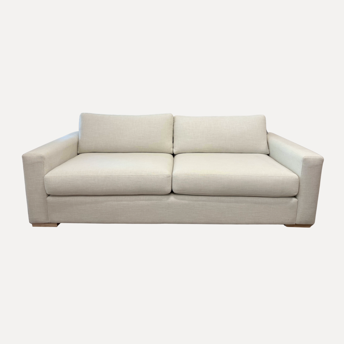 Beige sofa on a white background