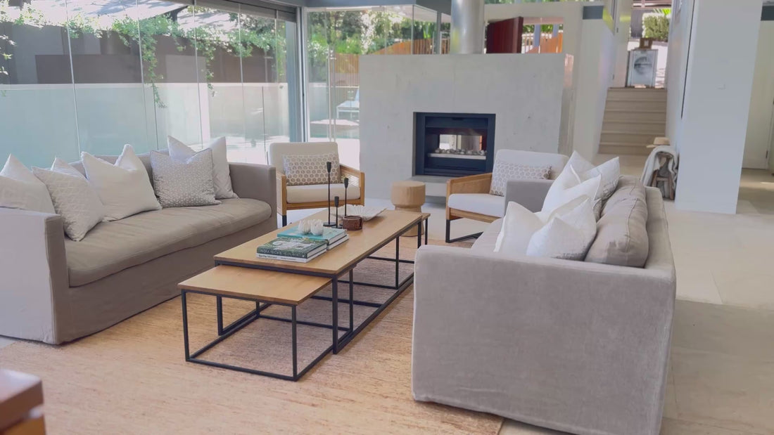 Grey linen sofa in living room setting